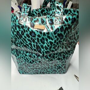 Consuela Grab N Go tote bag featuring a blue and black leopard print pattern.